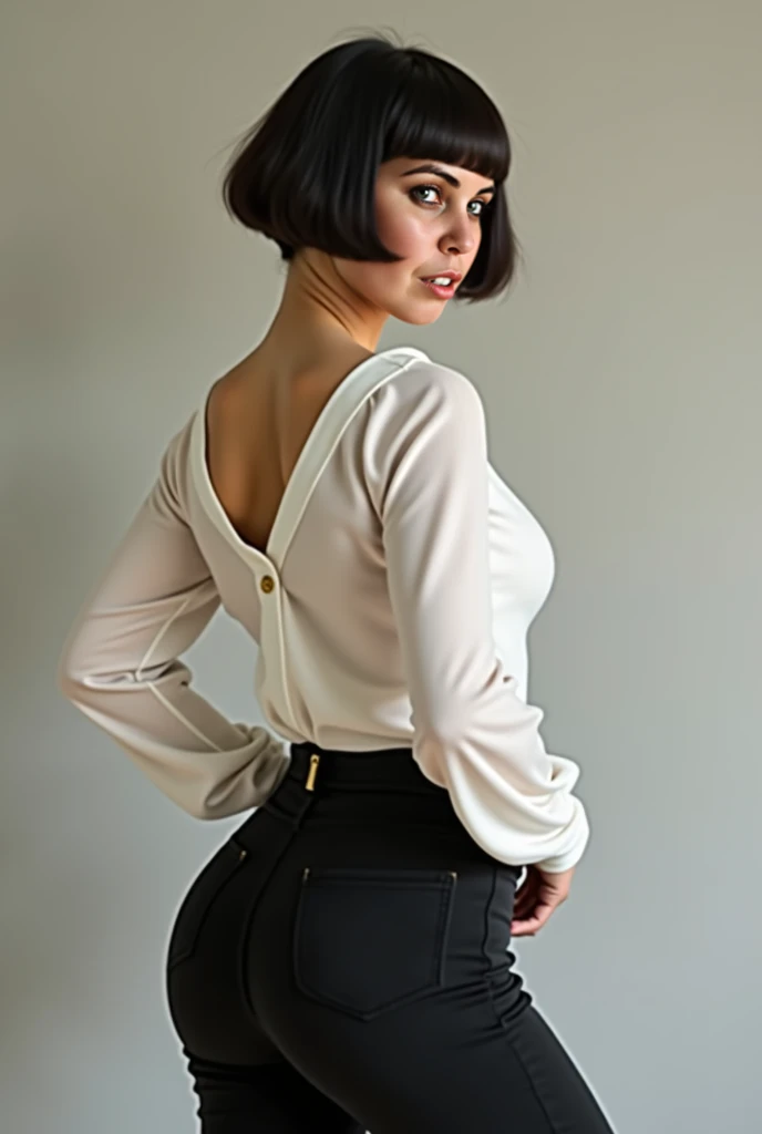 Victoria Beckham showing her butt dressed in a light blouse and leggings with a smile