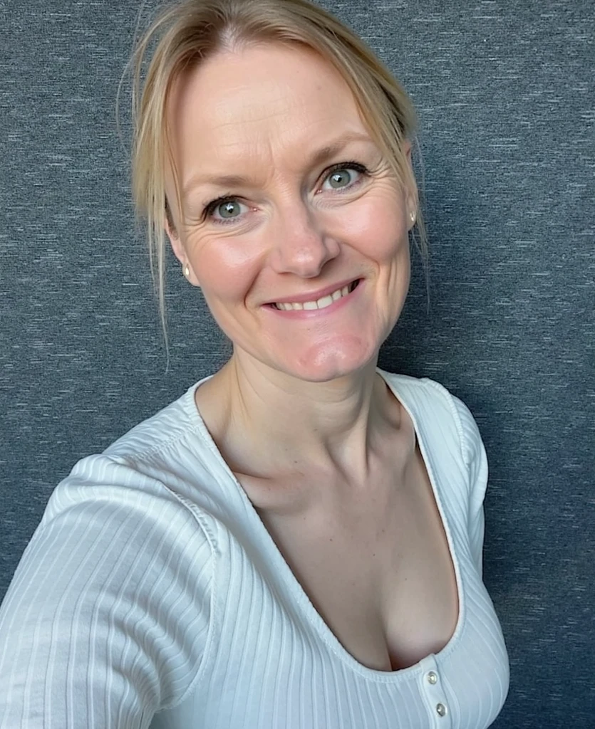 blonde woman with glasses and a red shirt and slacks smiling at the camera, this person does not exist, elderly person, scandinavian, mature facial features, aged skin, short, jean james-louise dalh wolfe-marthe jonkers-johanna rupprecht-cornelia geppert-suzanne engelberg-ilse gort merged, entire body visible, full body, hyperrealistic, best quality, 8K, real human skin, masterpiece, extremely intricate, medium closeup, detailed eyes, detailed face, detailed body, exaggerated features, pronounced features