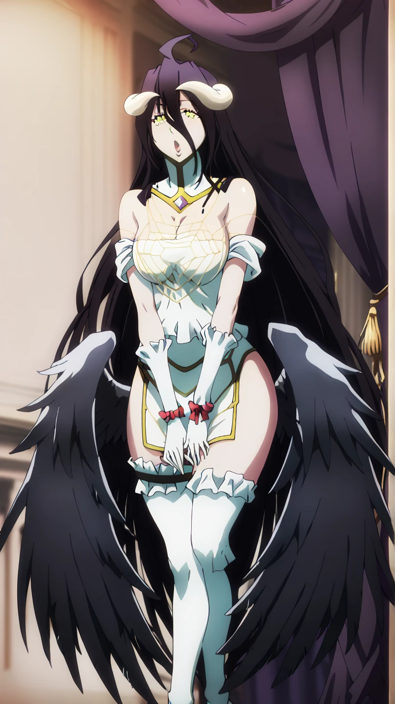 Albedo on the beach in a black bikini