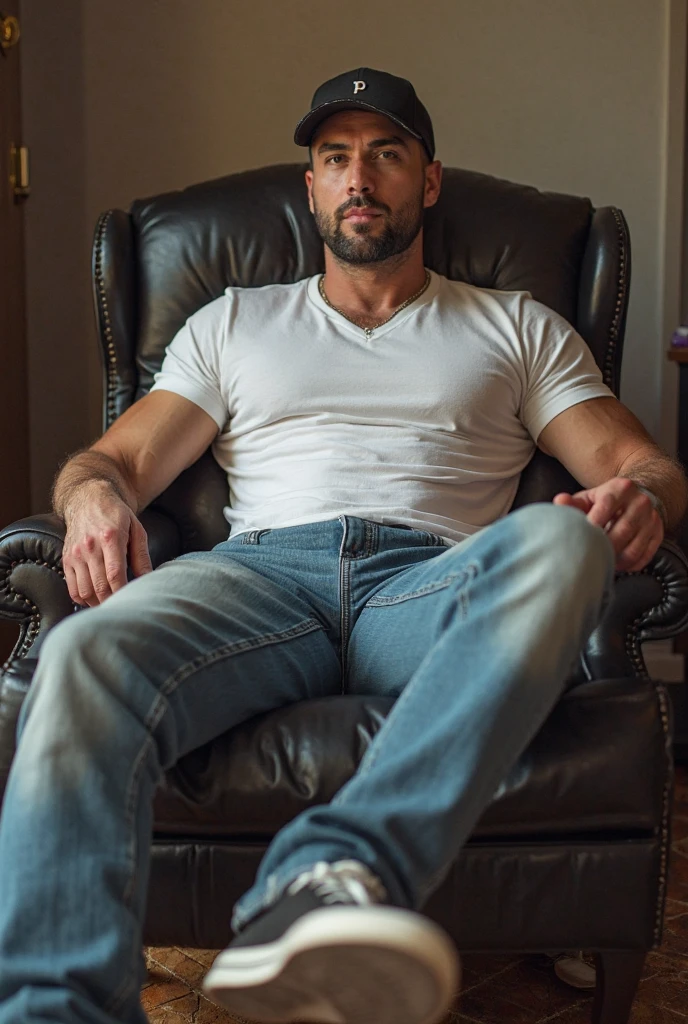 A handsome 30-year-old man with curly hair and brown eyes, he is shirtless and wearing jeans with the zipper open, he is sitting in a comfortable armchair, in the pose of a conceptual model, in the background a room well lit with sunlight. day