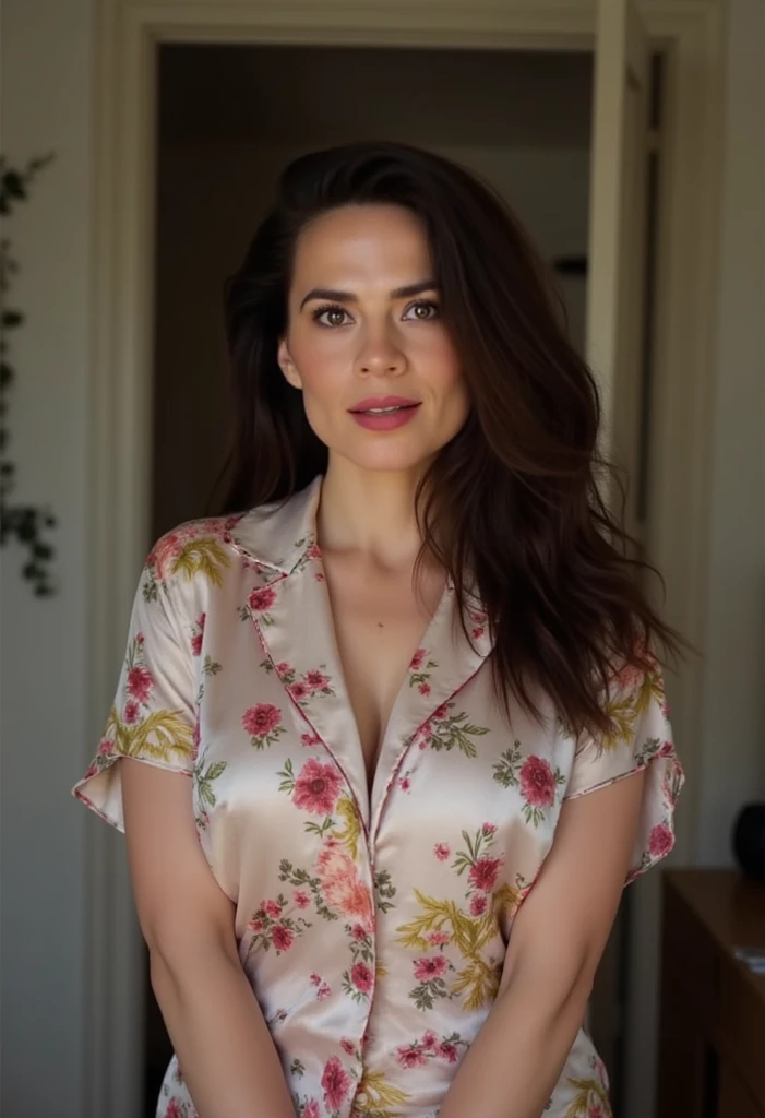 beautiful woman of 45 years olds, hair in bun with tendrils, looking directly at the camera, very realistic, instagram selfie, closeup face, at home, silk floral pyjamas, clothes tight against body, clothes too tight, film grain, fit muscular body, big breasts, focus on face and torso, clothes too tight, seductive,