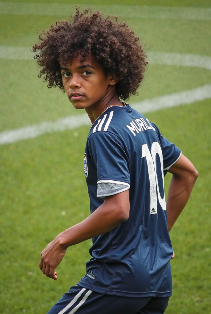 on a soccer field, a 12 year old boy has his back to the camera, watching the game. His name is Alves. He has curly hair, like Marcelo from the national team, light skin, very dark Brazilian, with brown color. Your eyes are amber green. Alves wears a colorful t-shirt with his name &#39;Alves&#39; printed on the back and sports shorts. The green grass is under your feet and the clear blue sky is above, creating the perfect setting for an afternoon of football."