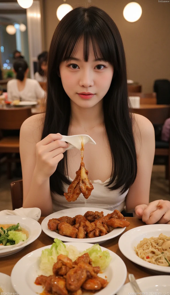 A woman in her 20s with long brown hair wearing a bath towel and eating fried chicken at a love hotel