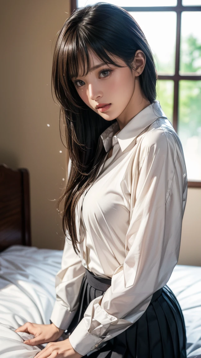Sexy woman wearing a shirt and black hair braided hair who is sitting on the bed 