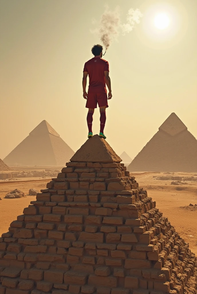 A handsome 1 man doing keepy-uppies in ancient Egypt