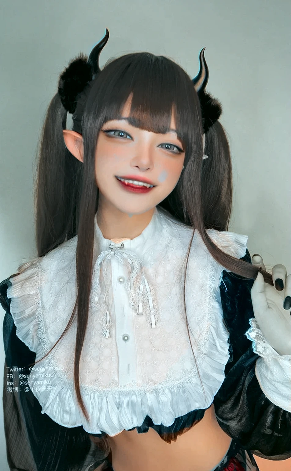 A boy with a small top hat, wearing a cold blouse half off the shoulder, a choker, with elf ears, with the tongue out doing a funny pose