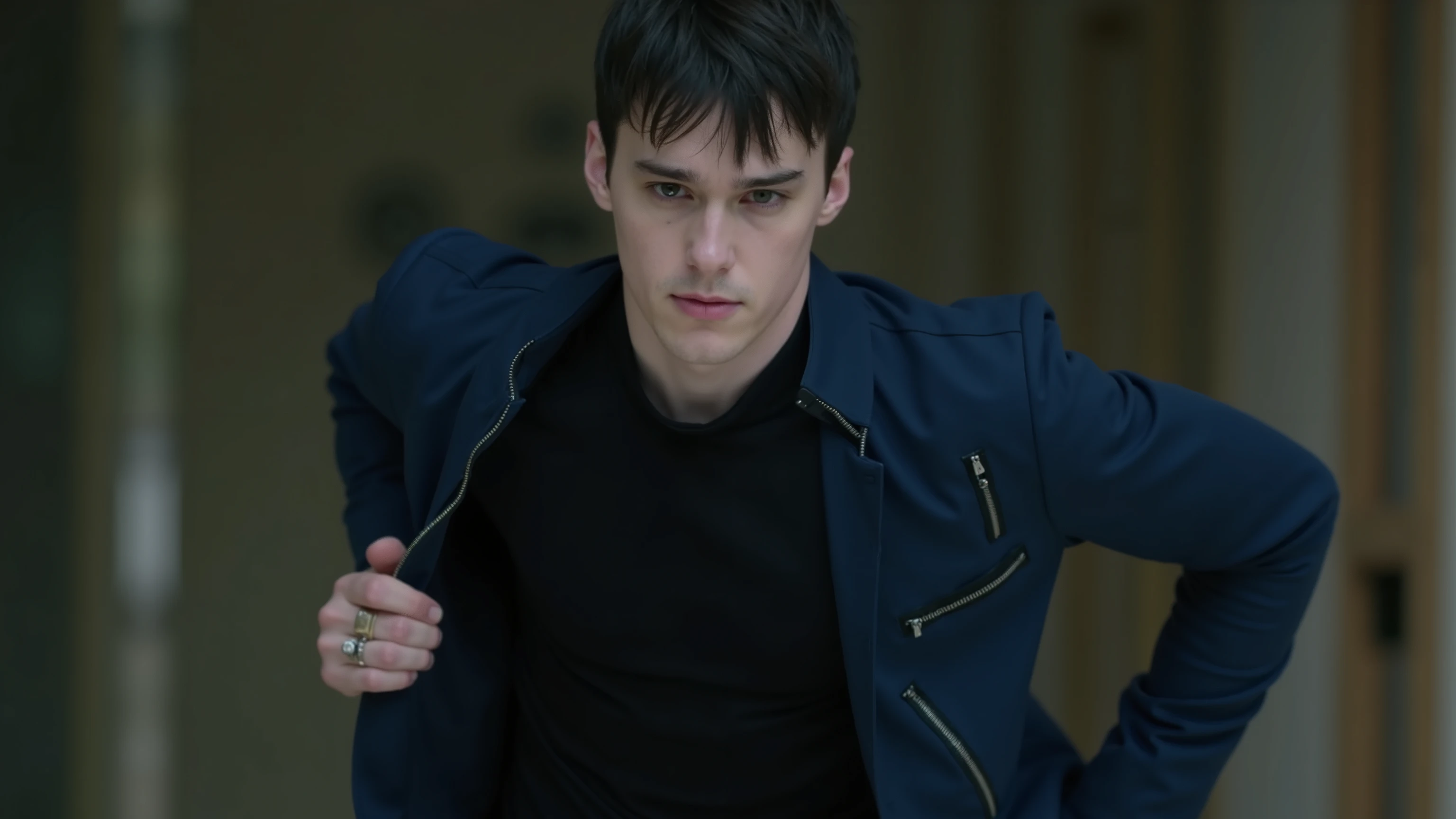 A man, 35 years old, pale skin, dark circles under eyes, subtle wrinkles, short slightly messy black hair, wearing a black high-neck techwear shirt, a fitted dark blue jacket with asymmetric zippers, slim black pants, black leather shoes, a minimal silver ring, looking at the camera with a blank, numb expression, cinematic lighting, highly detailed, 8k, --ar 16:9 --v 6.0