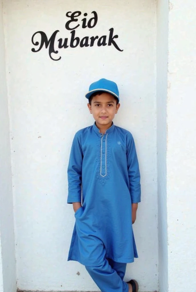 small pakistani child standing with one hanging on white paper. with front pose