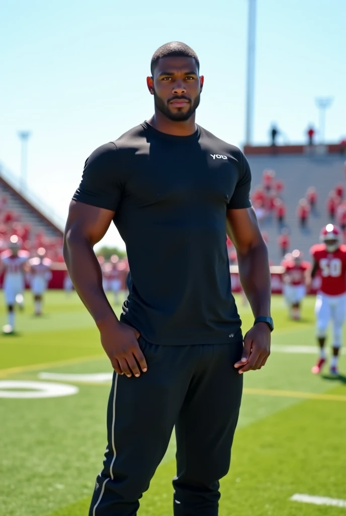 boy, 16 year old teenager, brawny, dark coffee tone skin, bluish brown eyes, rectangular face, medium curly black hair, thick lips, double chin, defined jaw, six pack abs, pernas brawnylas, wearing no shirt, confident grin, athlete, appealing, sensuous, wearing tight shorts for football, flexing his biceps triumphantly, posing in front of an American football field, Masculine Energy, determinate expression.