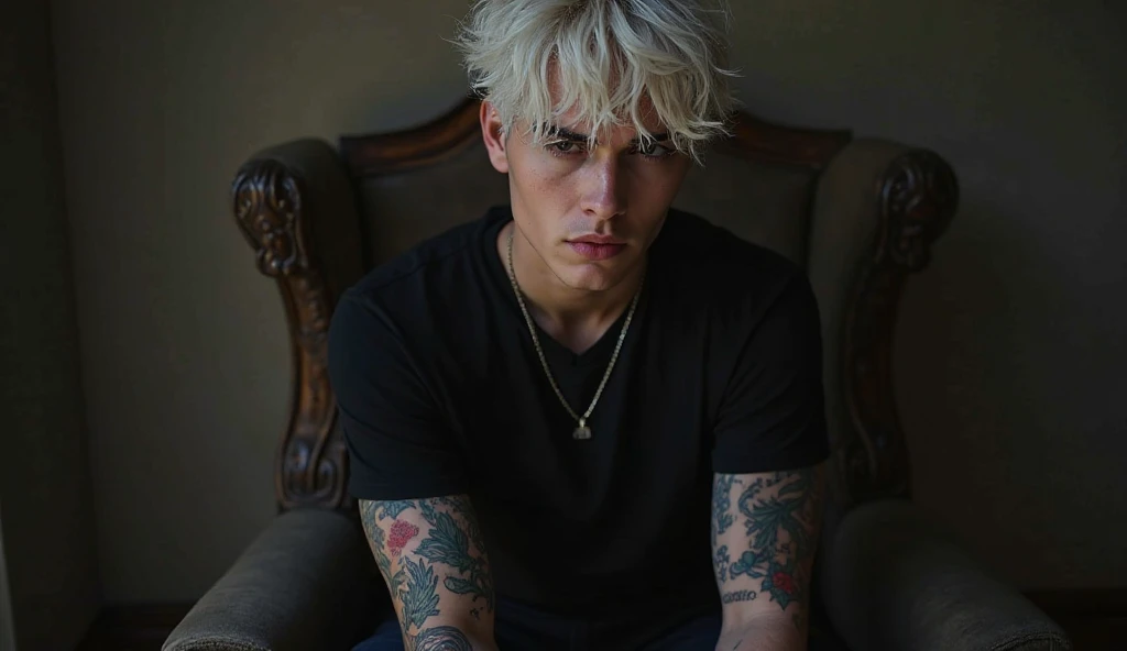Dark image, phosphorescent light, illuminated image, A young and handsome man of 20 years old, with curly blonde hair and green eyes that convey sadness. his face is attractive, Without beard, but with some marks that suggest it has been through difficult times. He is sitting on a sofa in a dark and neutral environment, with elbows resting on knees. He is wearing a white shirt that highlights his athletic figure and worn mechanic's pants.. Both of his arms are covered in tattoos., which adds an artistic touch to its appearance. The expression on his face reflects melancholy., creating an introspective atmosphere, that the image looks dark and only focuses on the young man