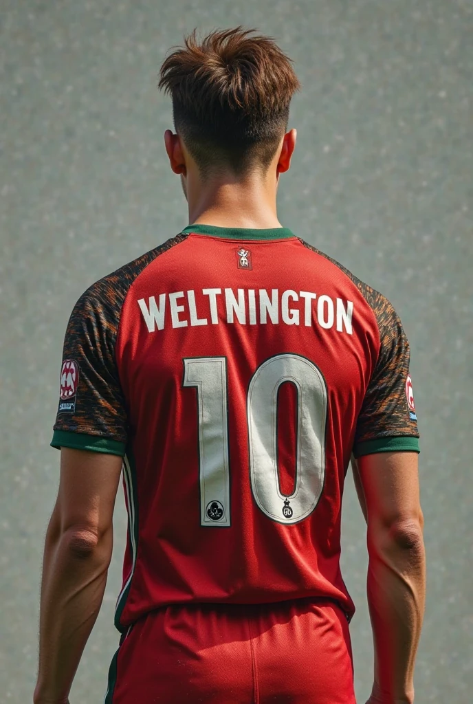 a man standing on a football field wearing a Portugal jersey named GUFRON no. 7 facing the back
