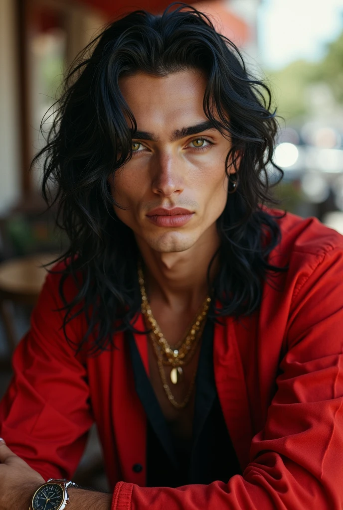 Young man with long black hair and green eyes