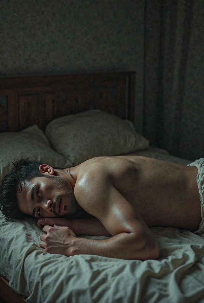 a room with red lights, a bed with white sheets. a piece of furniture that has a lamp on top, In the bed there is a boy lying on his back, His arms are muscular and are resting on the sides of the pillows, His hair is black.