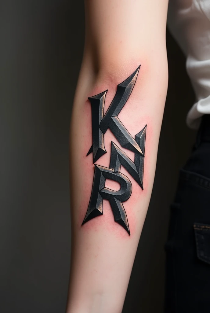 Tattoo with the names Kauê and Gabryel on the left forearm 