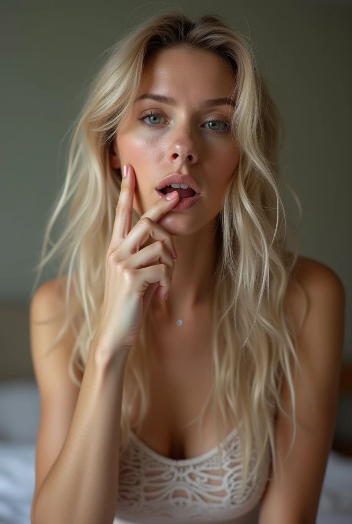 A beautiful naked blonde girl masturbates while putting a cock in her mouth