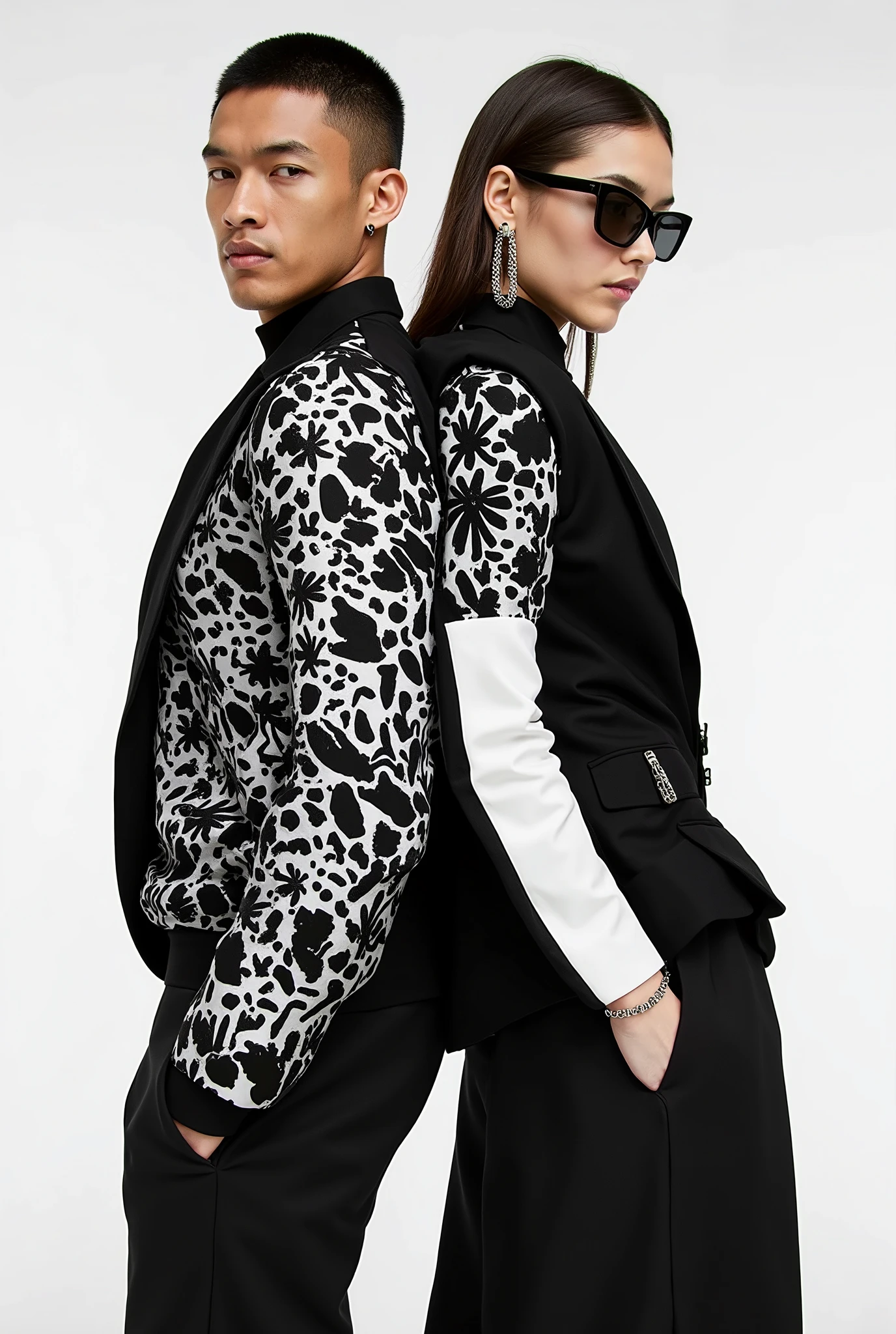 Man and woman modeling black and white for zara extemely realistic