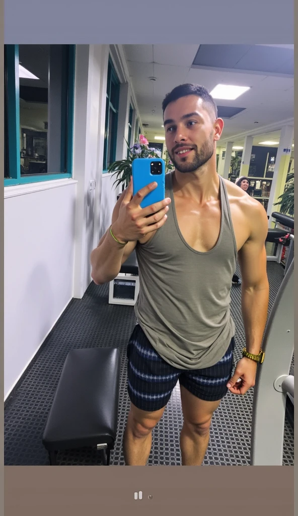 A sexy man taking mirror pics