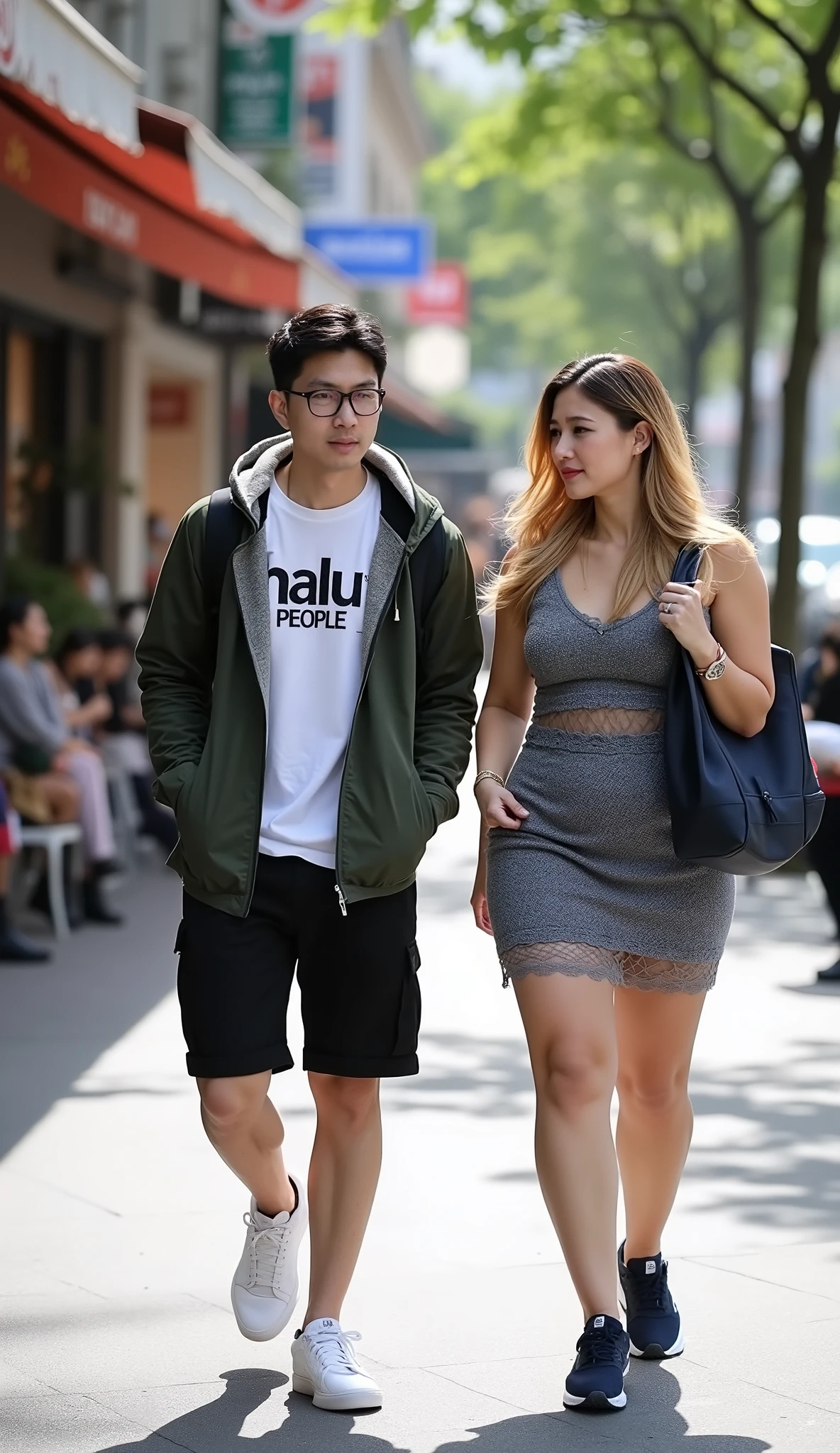I am taking a picture of a Korean man, looking to camera, he is wearing glasses, a white t-shirt with the words "halu people", layered with a dark green hoodie jacket, black cargo shorts, white vans shoes, a black backpack on his back, walking on the sidewalk with a curvy European woman with long wavy blonde hair, large breast, wearing a gray tank top layering mini lace mesh dress, blue sneakers, carrying a dark blue backpack. the background is the sidewalk, shops in the city of Hanoi, which is crowded and busy, sunny weather, clouds and sky,