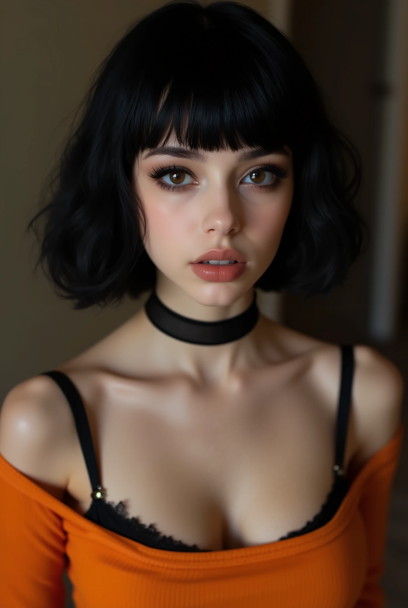 Amazing portrait of a cute goth woman with her short black hair in a bob hairstyle and she's wearing heavy eyeliner around her eyes and she's gazing at you seductively she wears an off shoulder t shirt that is orange and black with black bra straps 