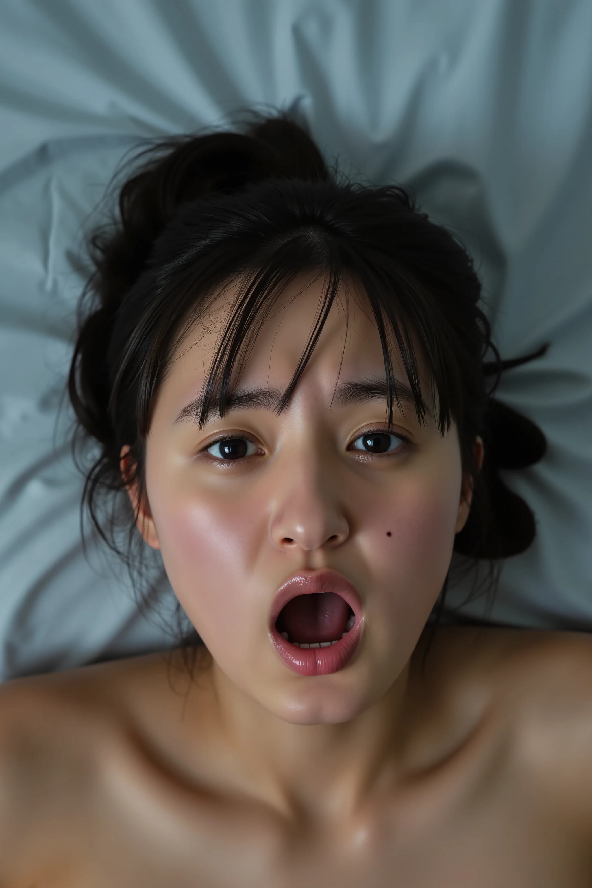 a high resolution photograph of a young Japanese woman lying in the bed with mouth open, bloodshot eyes, frowning, pain, scream, emotional face shot, face focus, from above, bare shoulders, realistic facial expression, dramatic facial expression, detailed face, detailed eyes,