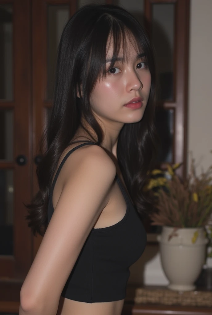 A woman wears a Chinese dress, revealing her legs and legs, black G-string panties, a black bra with a nipple cover.