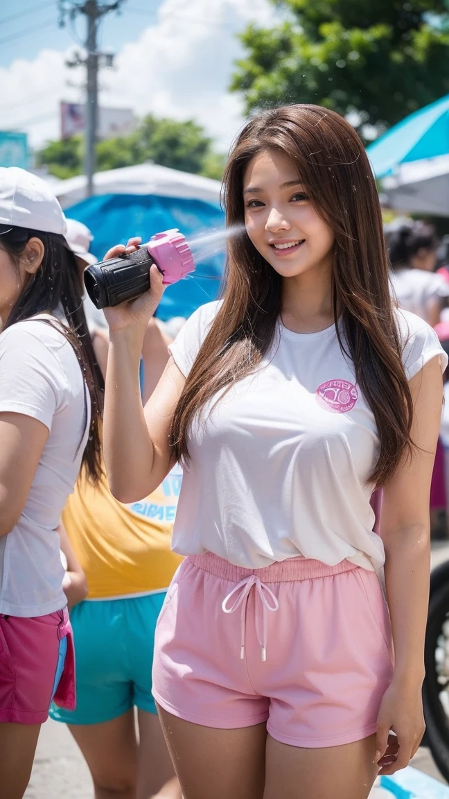 Songkran sexy Thai half White girl holding a water gun wearing colorful top and short pants