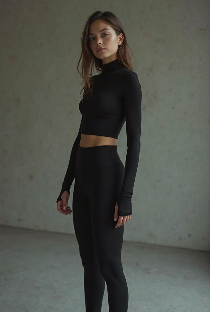 A female model Vika standing against a bricks wall background, wearing a black, cozy, long-sleeve sweater with rolled-up sleeves and black pants. She has long, straight hair and a subtle smile. The overall feel is casual yet stylish. shot on Leica M3 135mm f1.8 len, detailed image