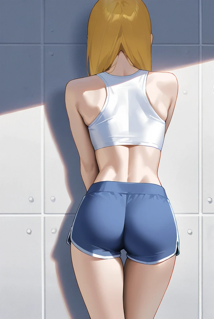 An athletic girl with shorts on the back