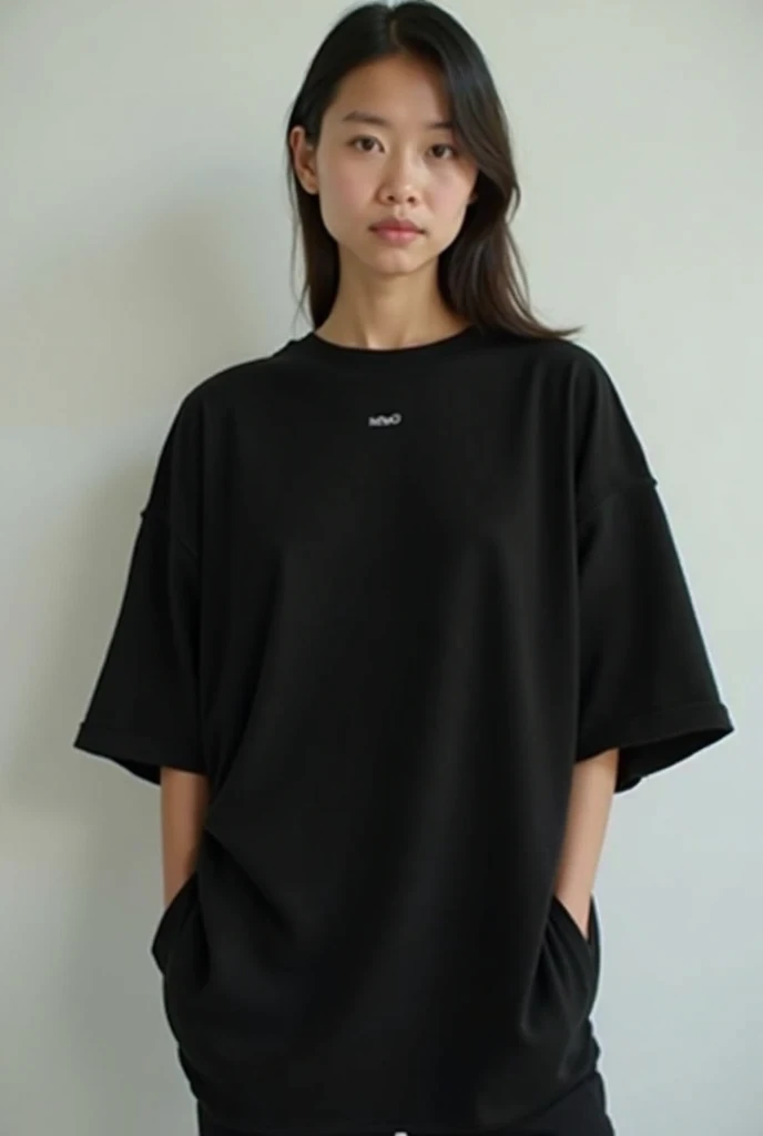 Two young black models, um and one , one from the front, the other from the back, wearing an oversized black t-shirt, with a white background for a unisex clothing brand, the one facing the writing; melo, small on the left corner of the chest, and the one on the back with a print with a photo