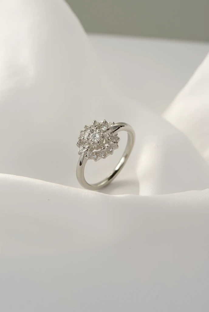 Remove the current background of this image and replace it with a soft, elegant background suitable for jewelry promotion — such as a blurred white or pastel backdrop with subtle lighting. Enhance the shine and details of the silver ring and the small gemstone to make it stand out clearly for an online store display.