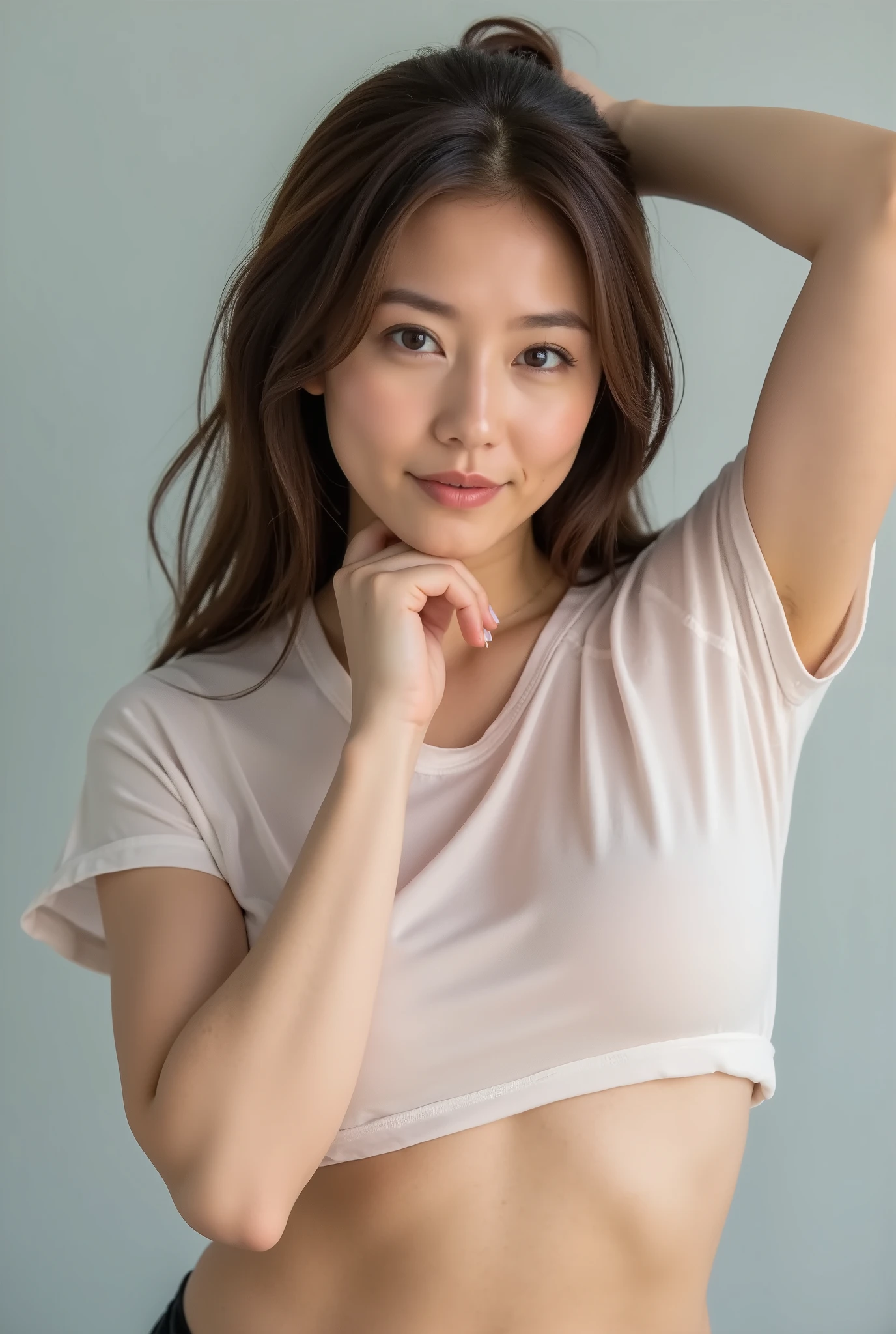 A woman wearing a wet t-shirt that shows through where it comes into contact with her skin、active pose、feels good