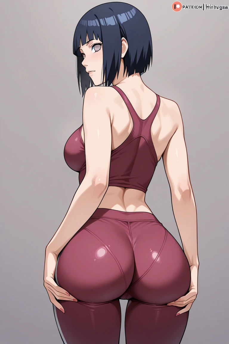 Woman in crop top and sweats