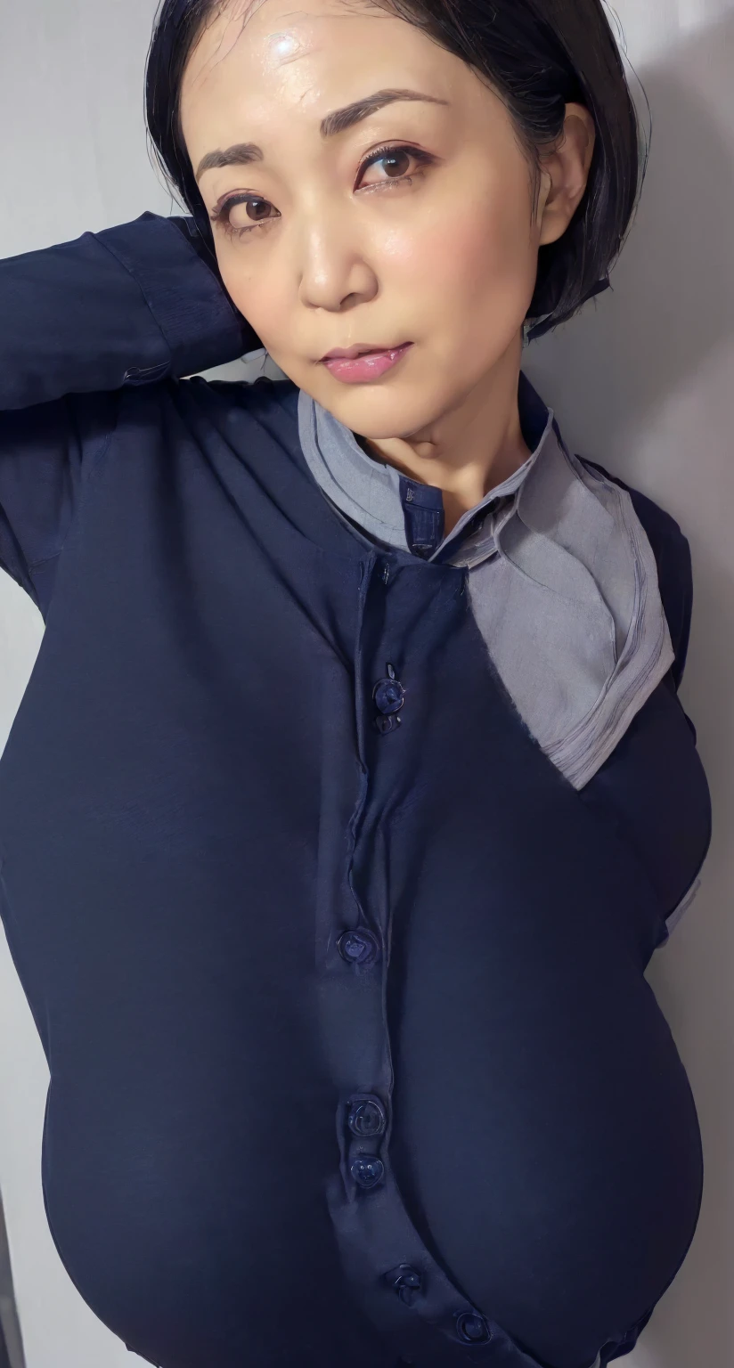 "Create an image of a plain navy blue long-sleeve women's polo shirt designed for hijab wearers, with a batik pattern on the collar, set against a framed background. Focus solely on the shirt without any person wearing it."