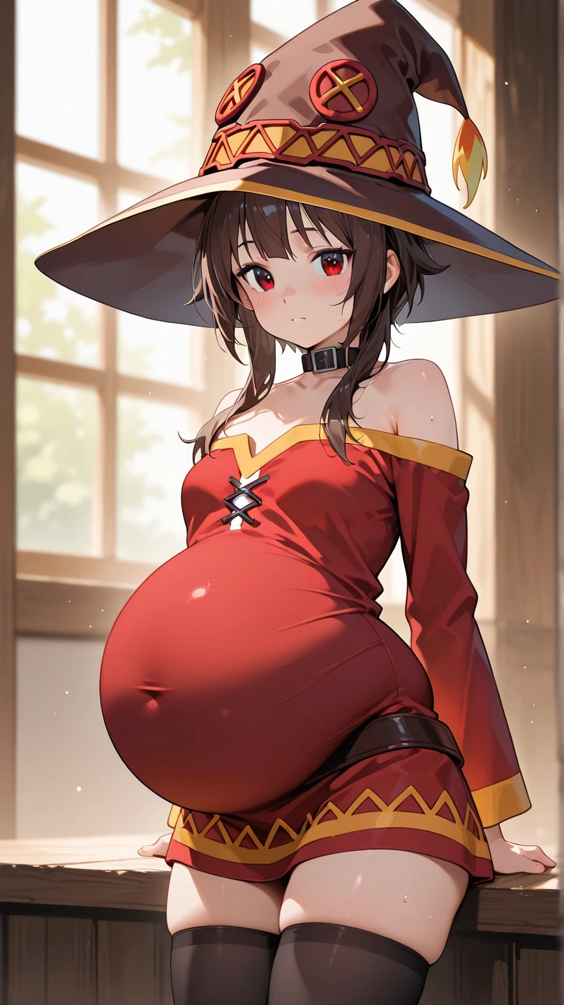 Heavily pregnant girl wearing a cloak