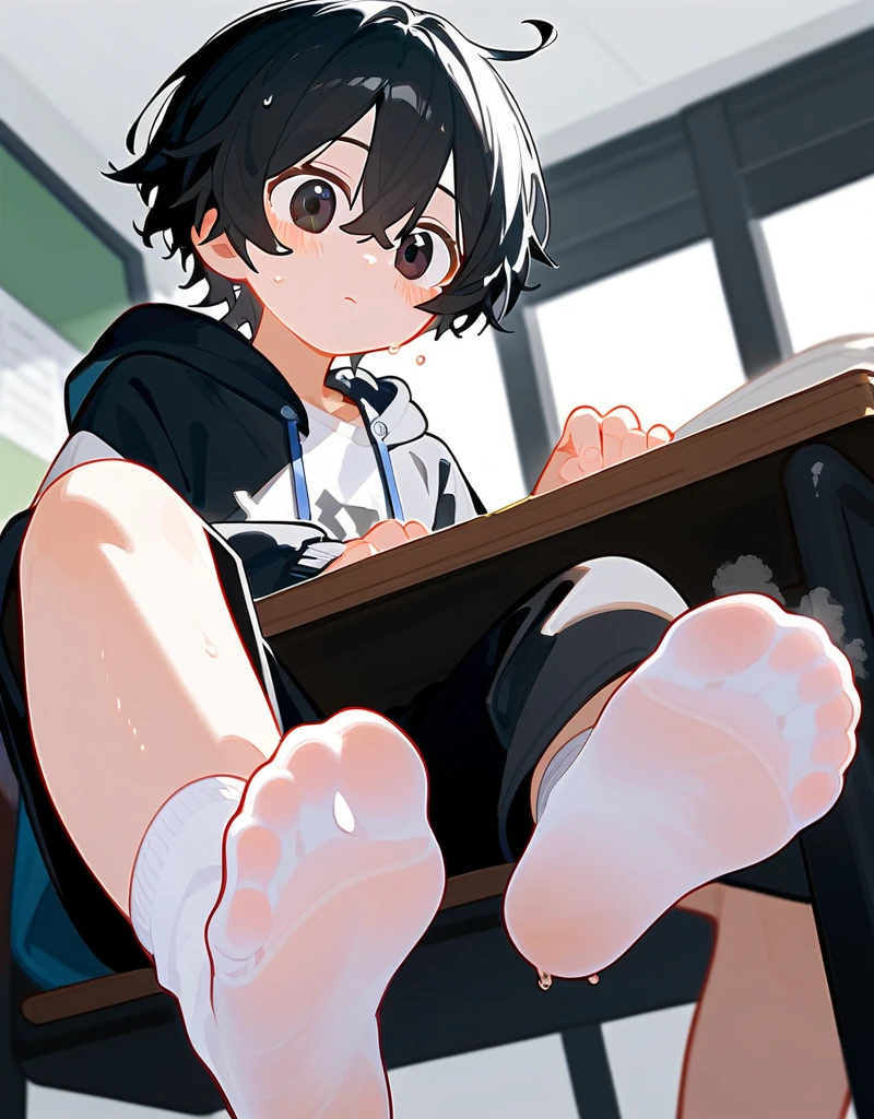 Boy showing the soles of his feet while scrunching his sweaty soles in white socks sitting on chair while his feet under the camera with shoeplaying