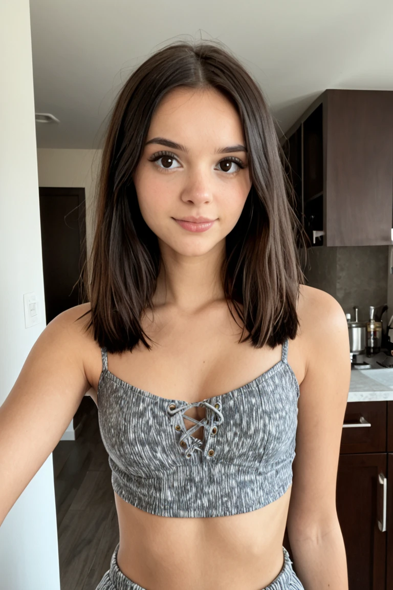 Sabrina Carpenter with dyed black hair and naked with a smile