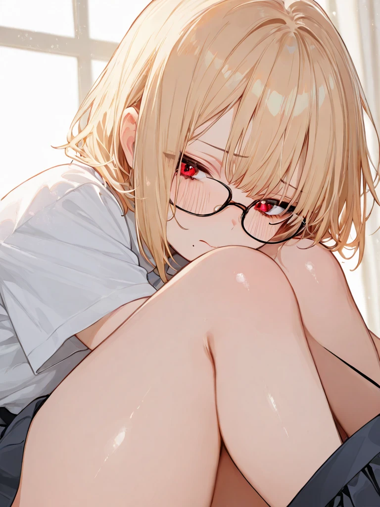Blind boy in blue sweater wearing glasses sitting in the park at night without much light in the area below with his legs open while yawning