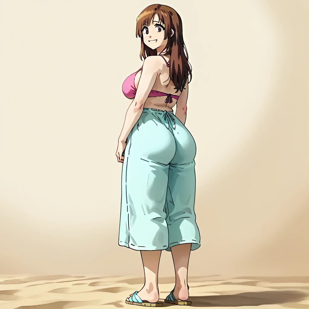 House shorts, a pile of sand under her foot