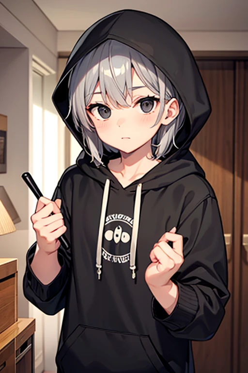 This boy in a black hood，露出一个滑稽🤪的笑容。