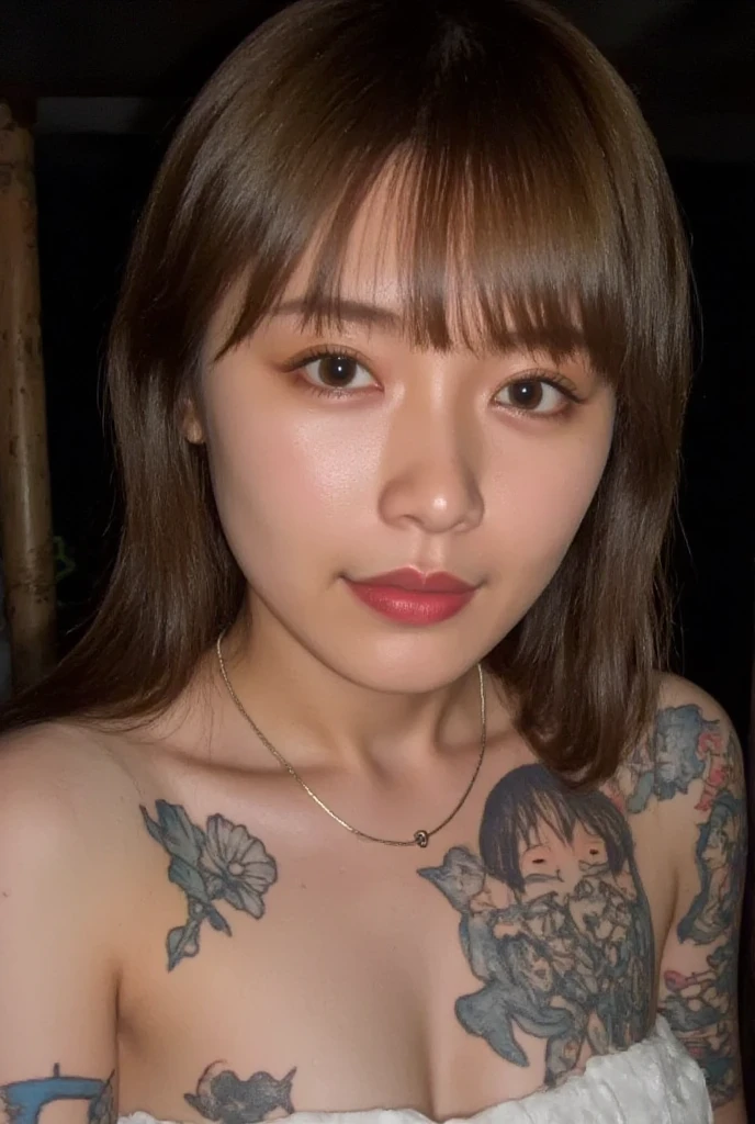 black hair with red highlights, reddish brown eyes and tattoo on the chest. 