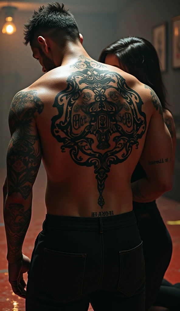 a man with an athletic build is sitting in a chair facing backwards while a female tattoo artist is making tattoos on his back.