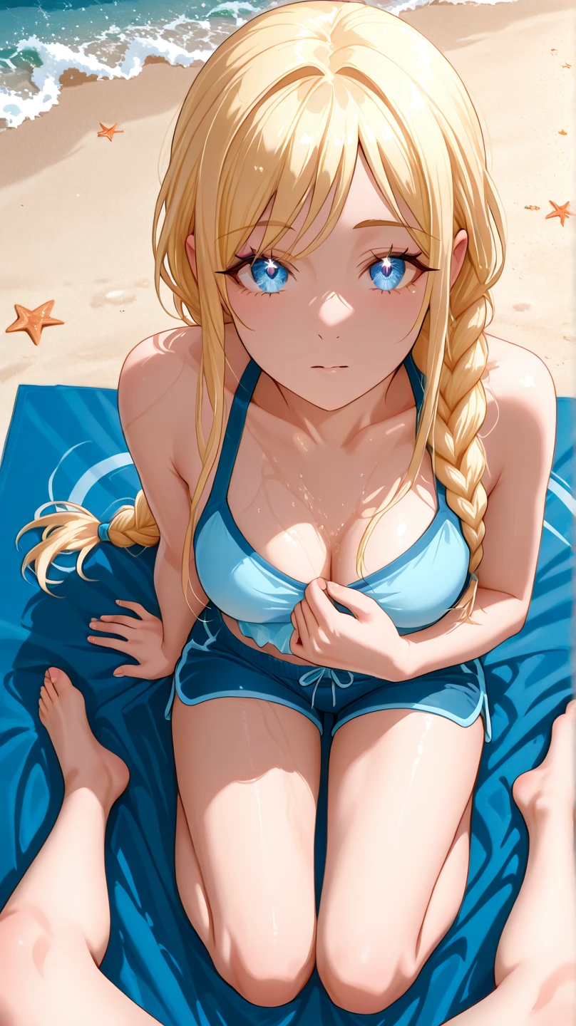 Blonde teenage woman with blue eyes enjoying on the beach looking at you .
