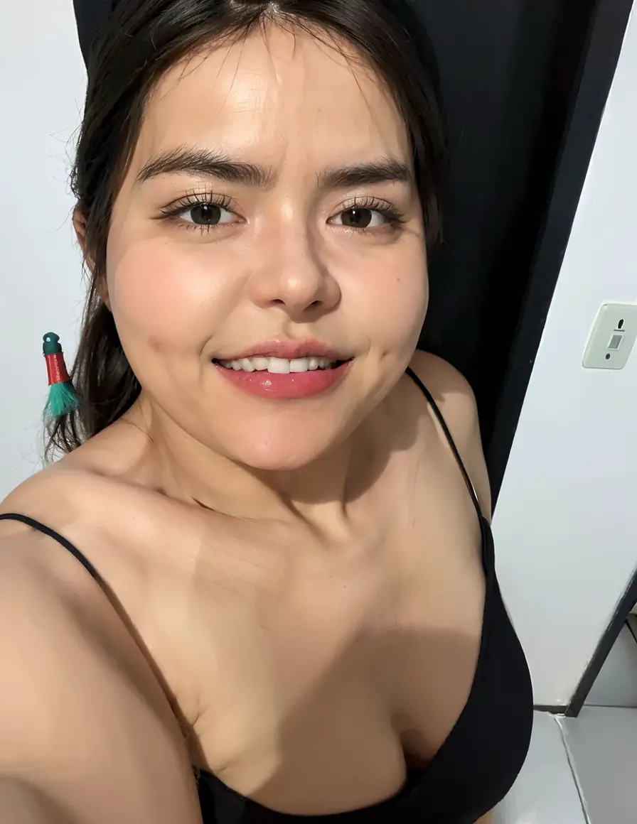 (From a birds-eye, above perspective), 1girl, high quality, high resolution, 4k, thin, 25 year old, solo, June, JuReis, wearing cute top, eyes looking up, looking up at viewer, pursed lips, realistic, nose, flirting with camera, kneeling in a fitting room, looking seductively at viewer