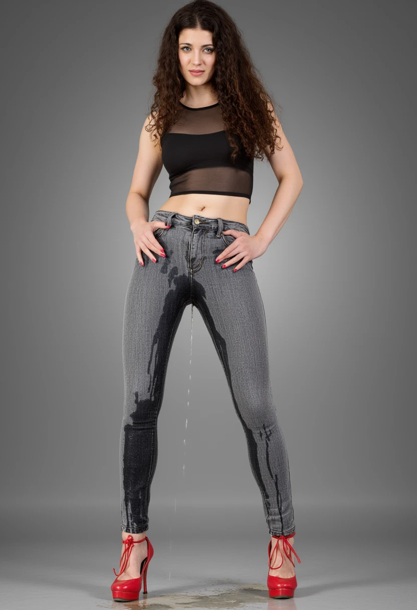 Close up on the crotch of a sexy woman wearing a super skinny washed-out black jeans.