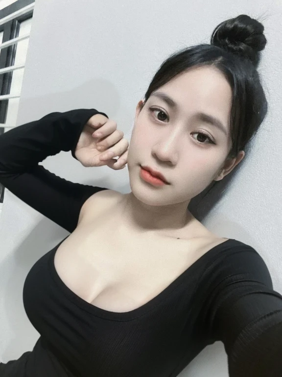 highest quality,masterpiece,Ultra-high resolution,(Realistic:1.4),Beautiful lighting, (Highly detailed CG Unity 8k wallpaper), Beautiful face in every detail,Detailed clothing, 50mm portrait photography, One Girl,Big black eyes, cute, young, Temporarily stop, Facial lighting, Physically Based Rendering,Written boundary depth , Black Hair, Mole under the eye,(Serious face), ((Take from above)), (Please open your mouth wide),Japanese women、20-year-old、camisole、(Large Breasts),Young and beautiful woman taking a selfie, Taken with iPhone camera