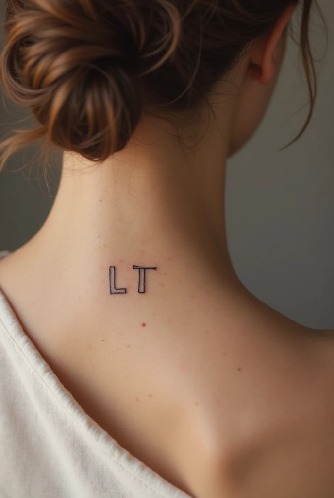 Simple feminine tattoo of the lyrics “you’re the greatest thing we’ve lost” with a wrench on upper arm