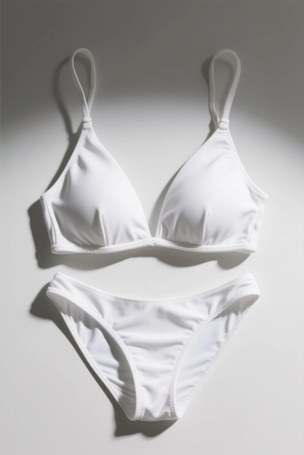 There are white bras on the branches in the woods, very tight little push-up bras, sexy push-up bras, white bras, tight push-up bras, large leaf bras, push-up underwires, push-up underwires. Complex, bra, open V corset, training bra, wavy underwear, wear bra, full-length view. White plastic. Light and shadow shine in from behind, and summer feels like it