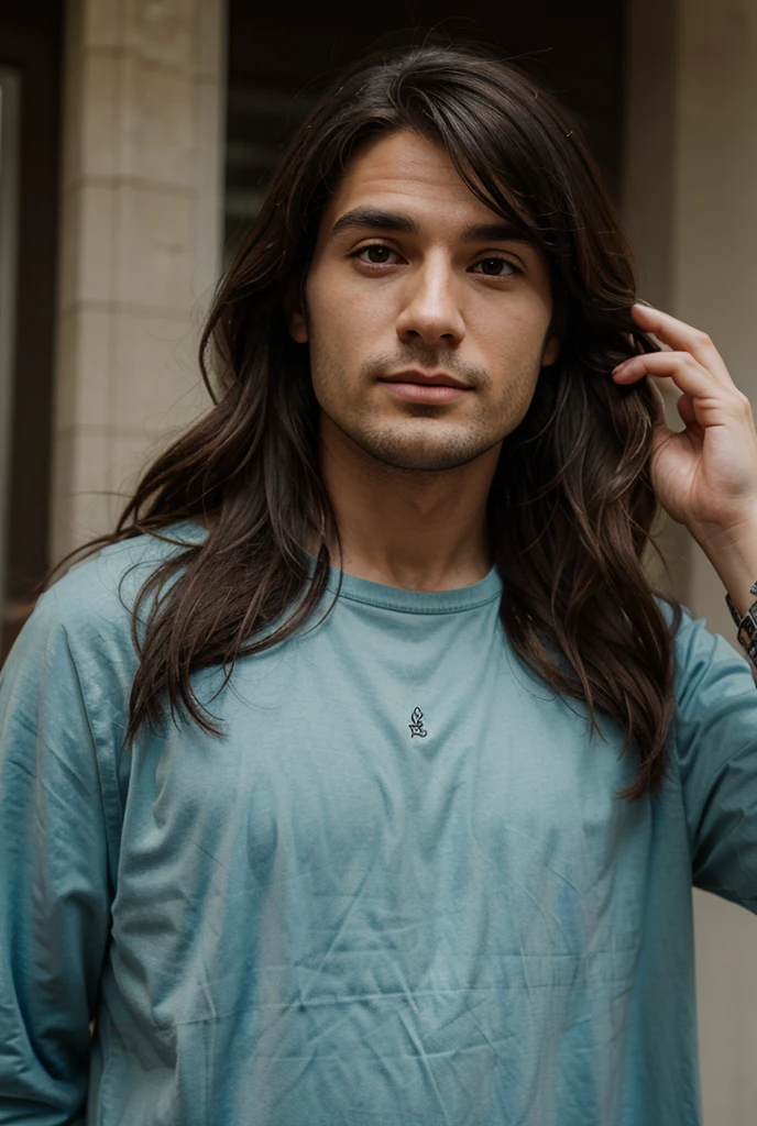 Guy with dark hair, in a warm gray sweater