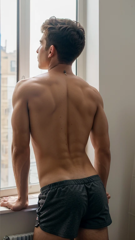 A naked man with his back