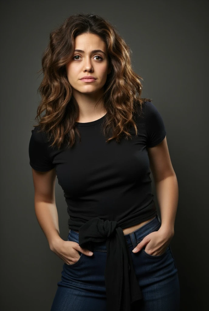 Photo of Chloe Bennet, modelling in front of black background, photo studio, cleavage, black tube top, jeans